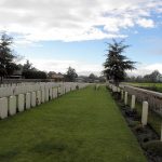 Neatly lined gravestones in Potijze Chateau Cemetery