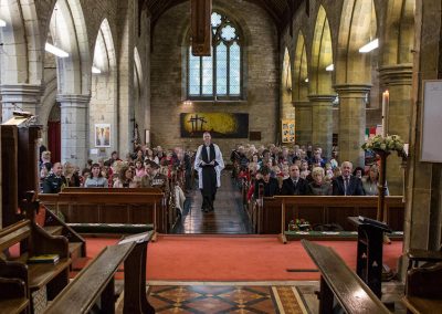 Rev Craig Groocock enters the church