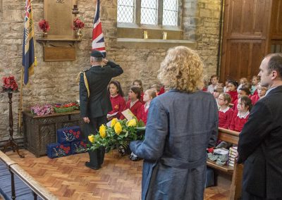 Lt Col Rushen salutes the church war memorial